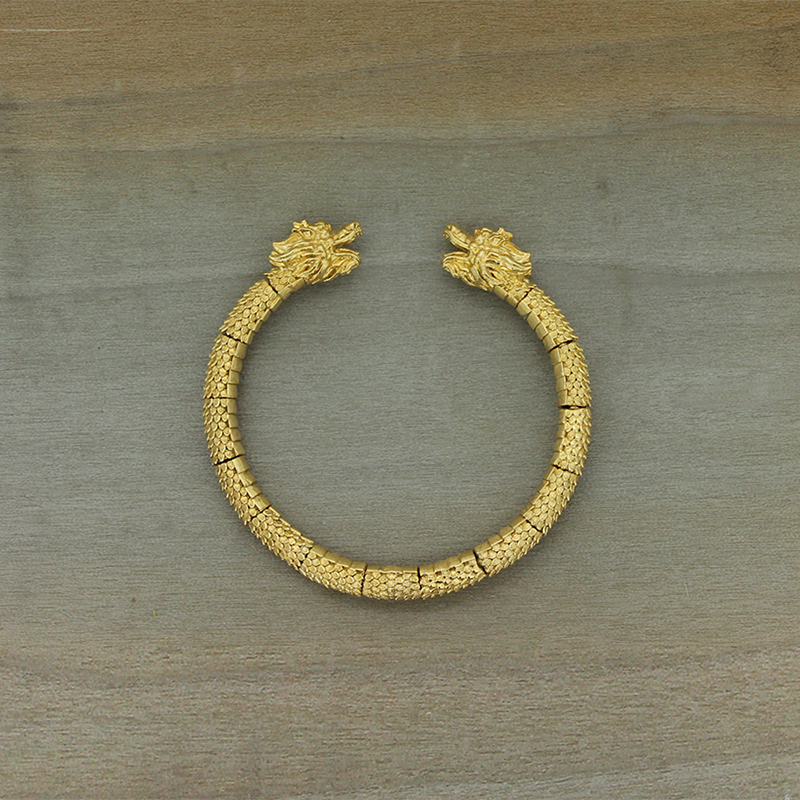Pulsera dragón bañada en oro