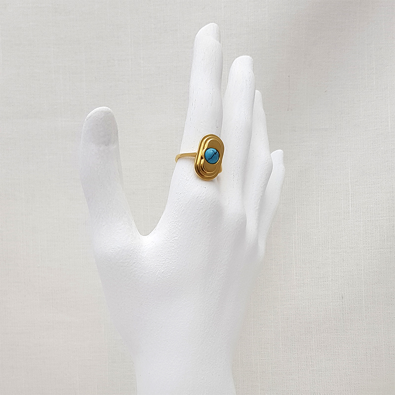 Calamidad-anillo-metropoli-grande-oro-turquesa Anillo Calamidad metrópoli ovalado con turquesa